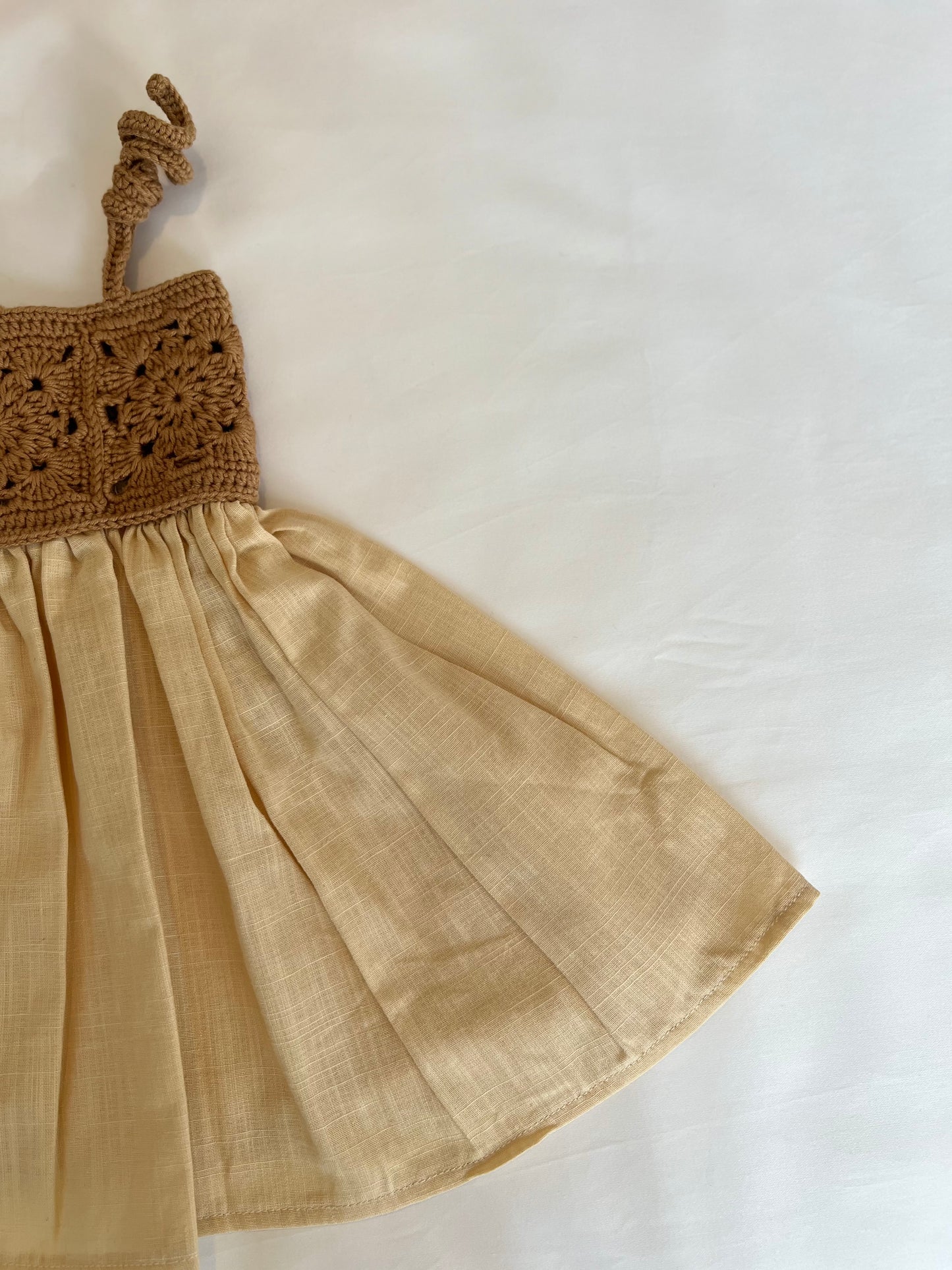 The crochet dress in tan