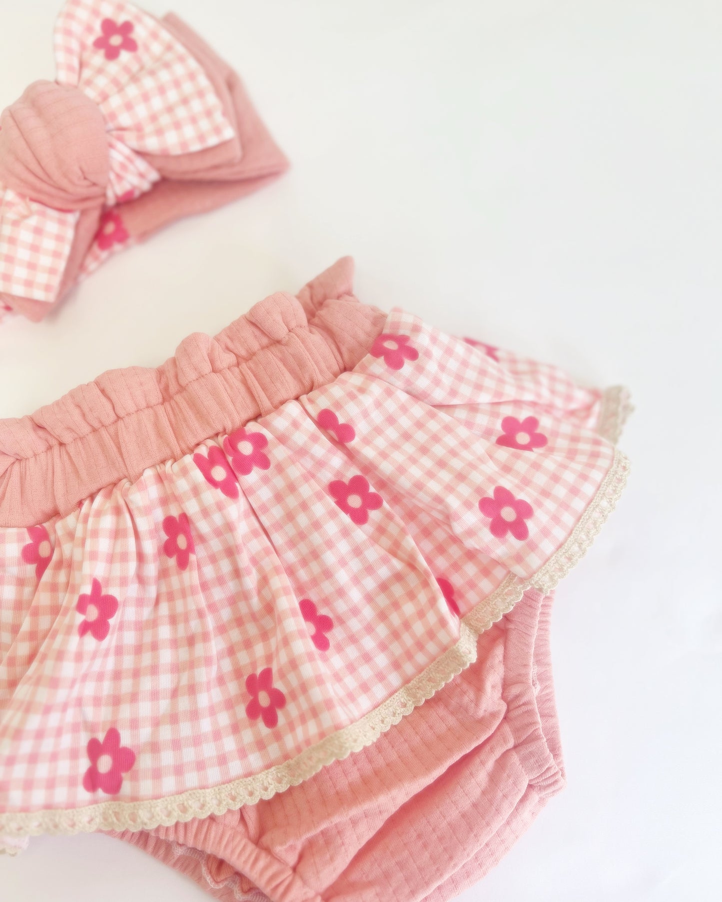 The Daisy peplum bloomers and chunky top knot-sold as a set