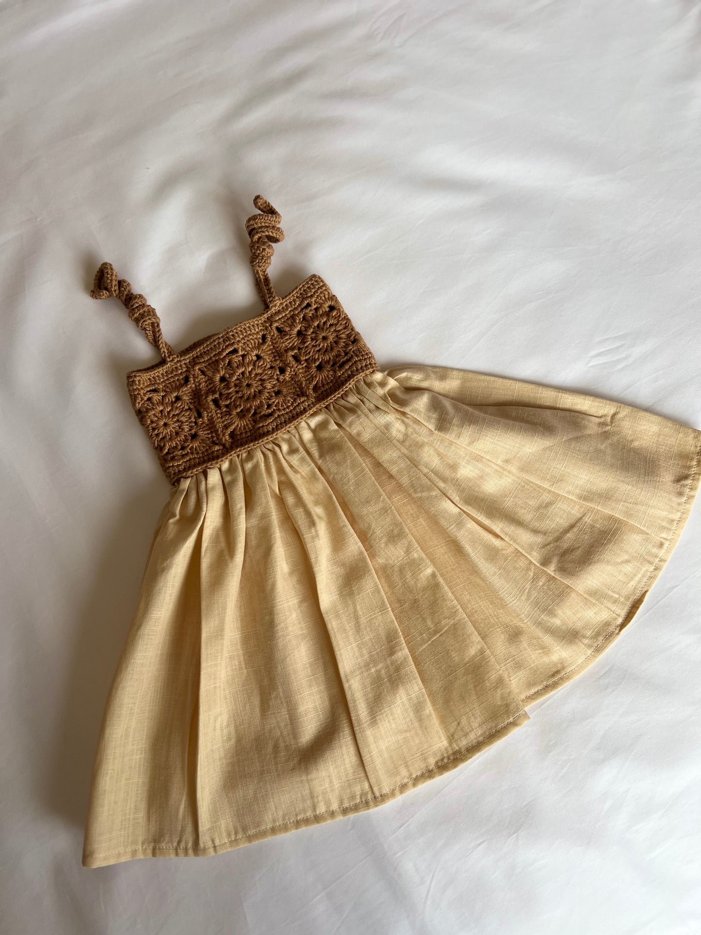 The crochet dress in tan