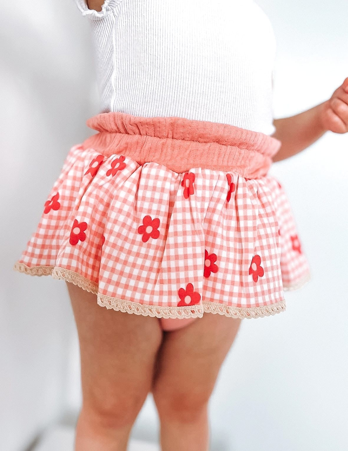 The Daisy peplum bloomers and chunky top knot-sold as a set