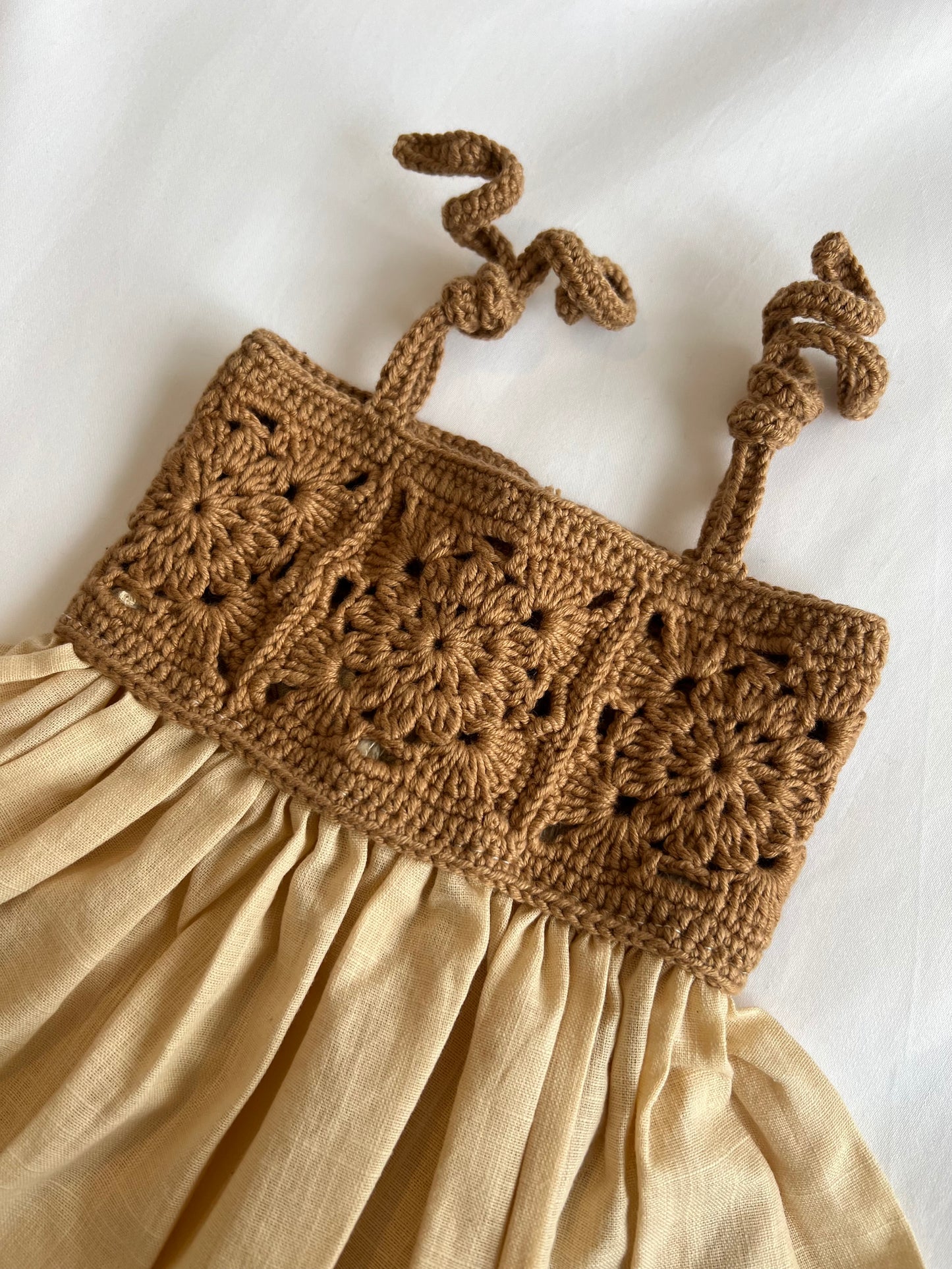 The crochet dress in tan