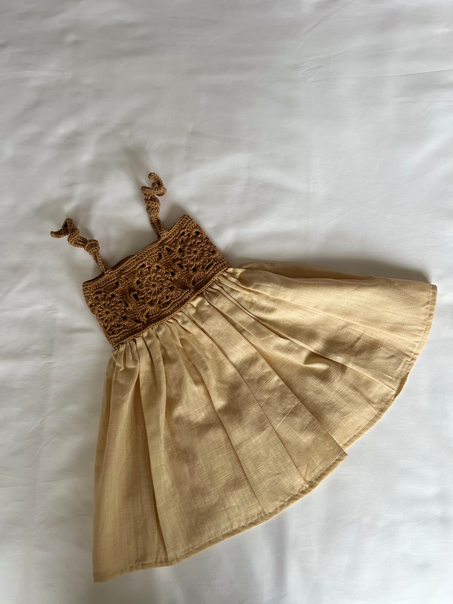 The crochet dress in tan