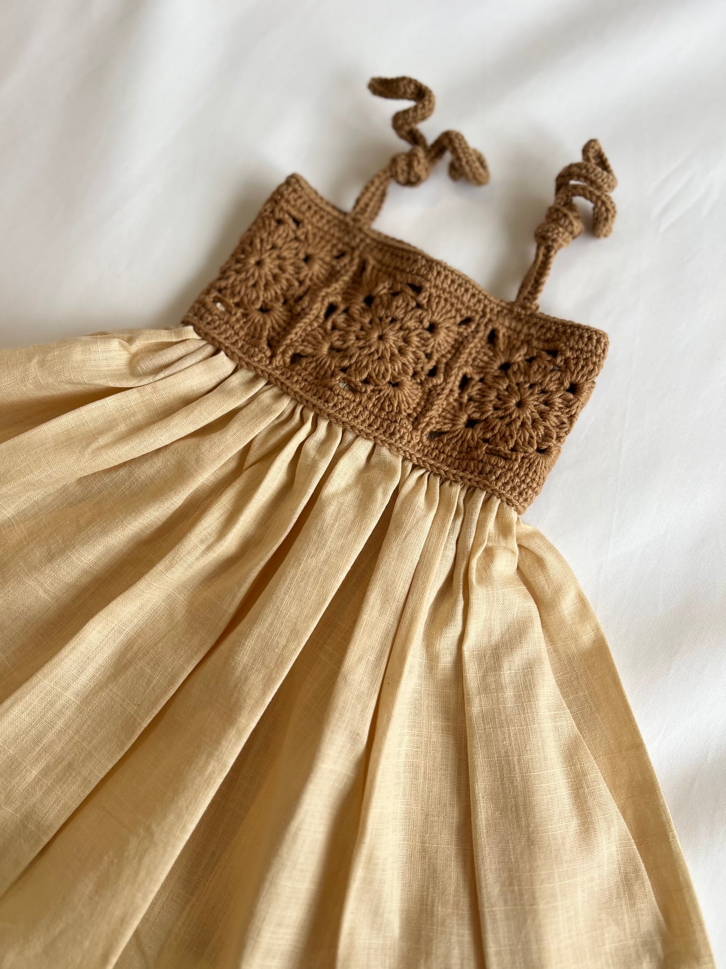 The crochet dress in tan