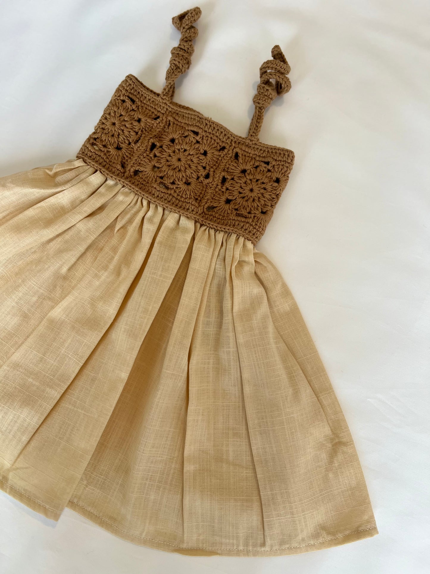The crochet dress in tan