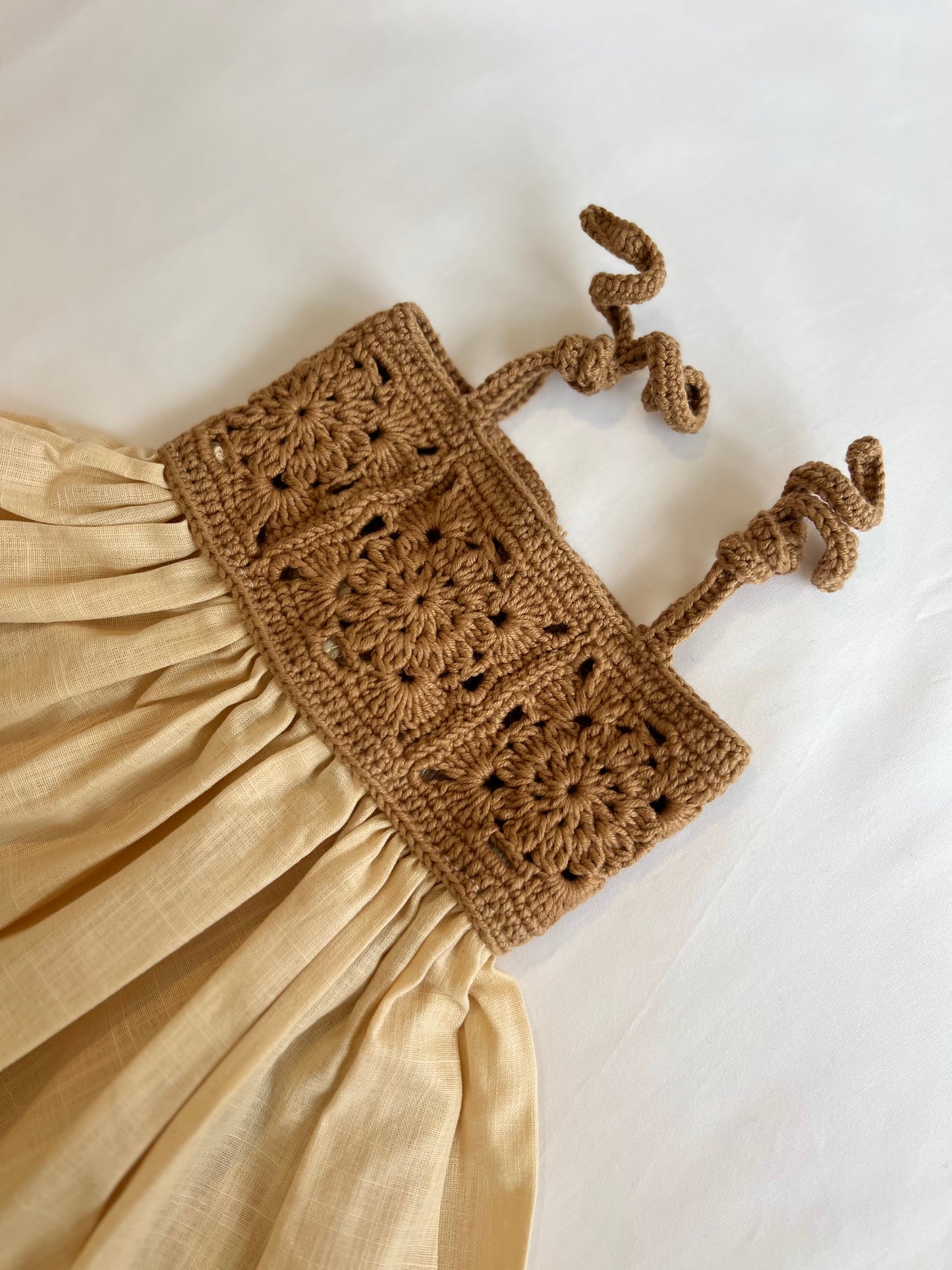 The crochet dress in tan