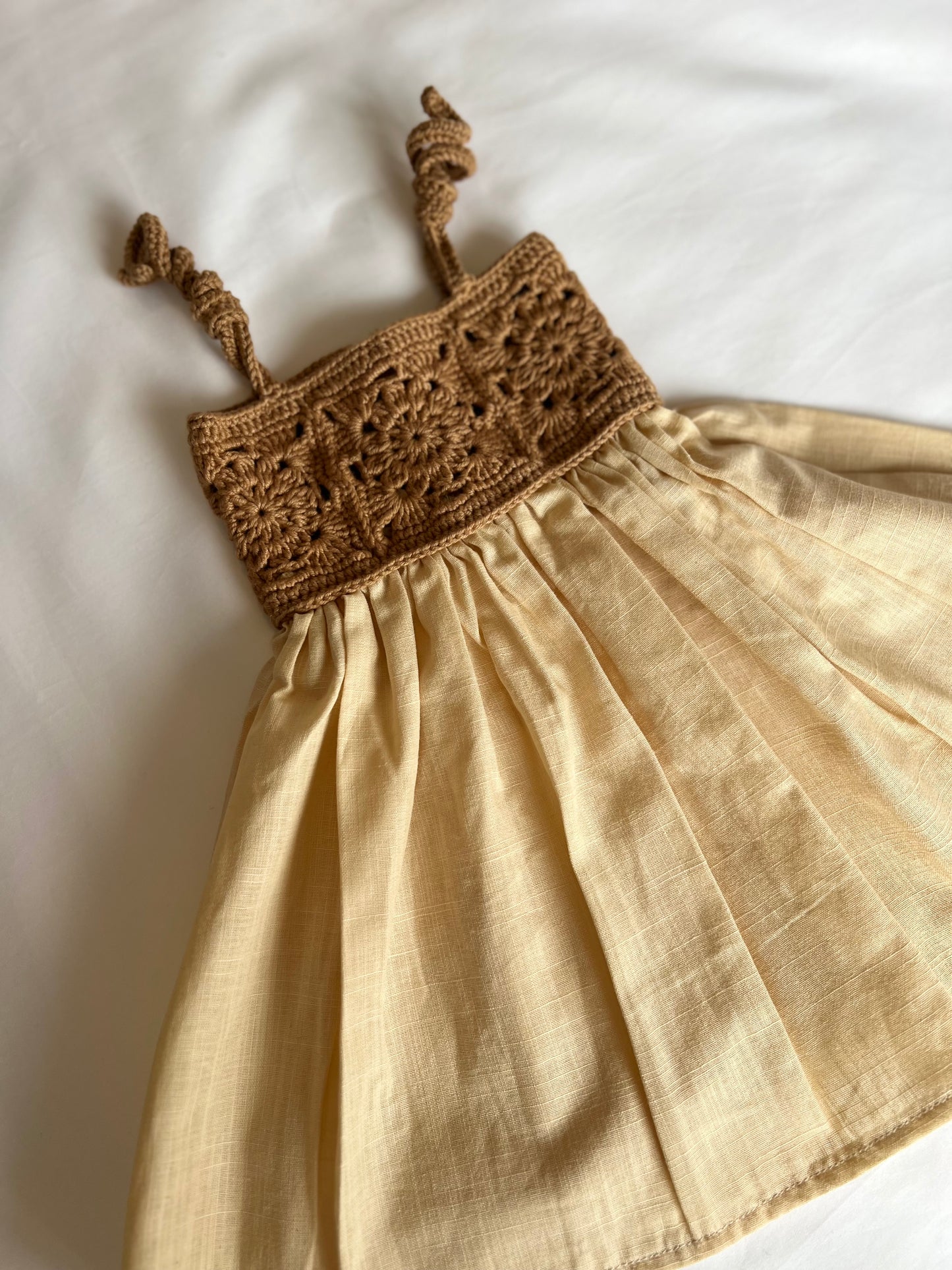 The crochet dress in tan