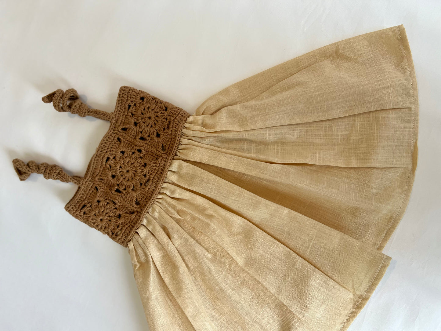 The crochet dress in tan