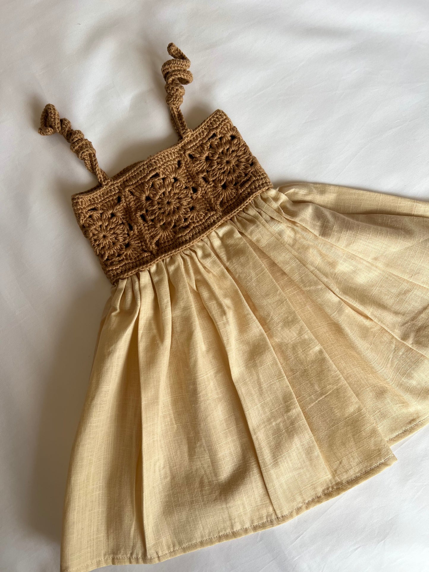 The crochet dress in tan