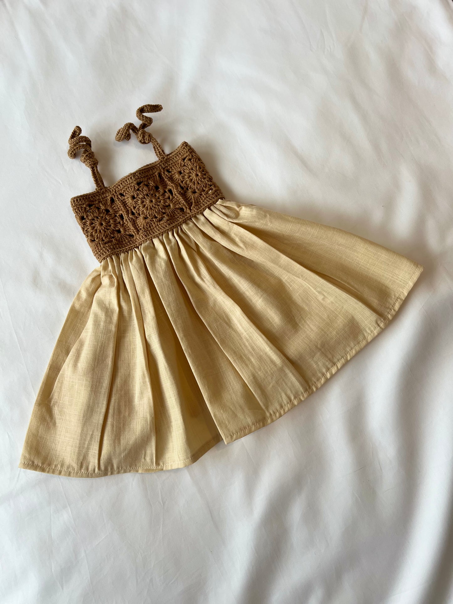 The crochet dress in tan
