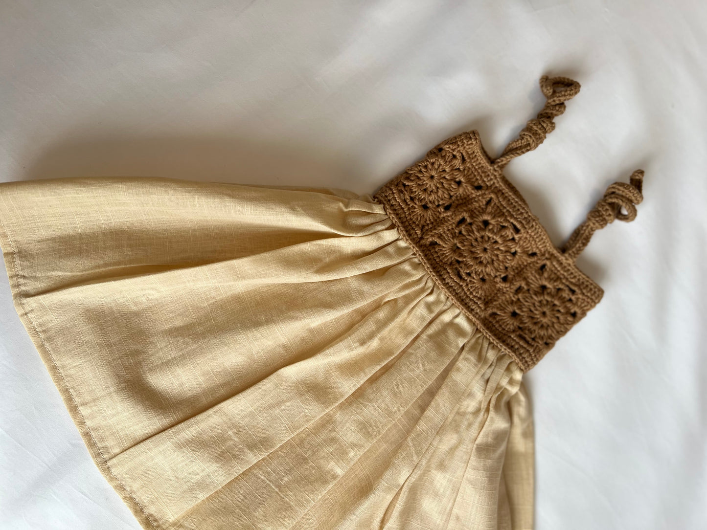 The crochet dress in tan