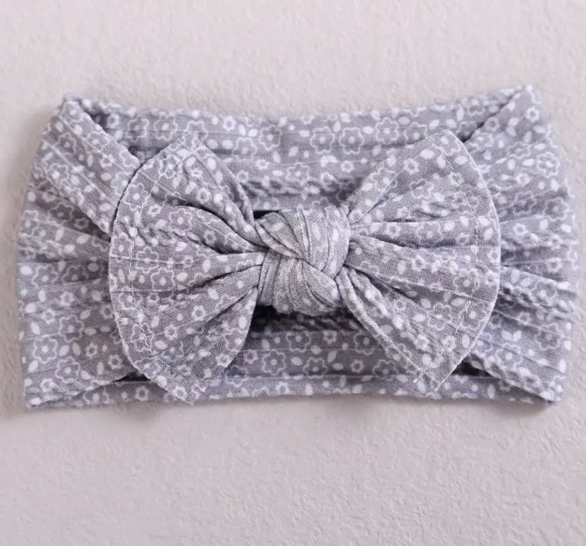 Floral cable knit bow headbands