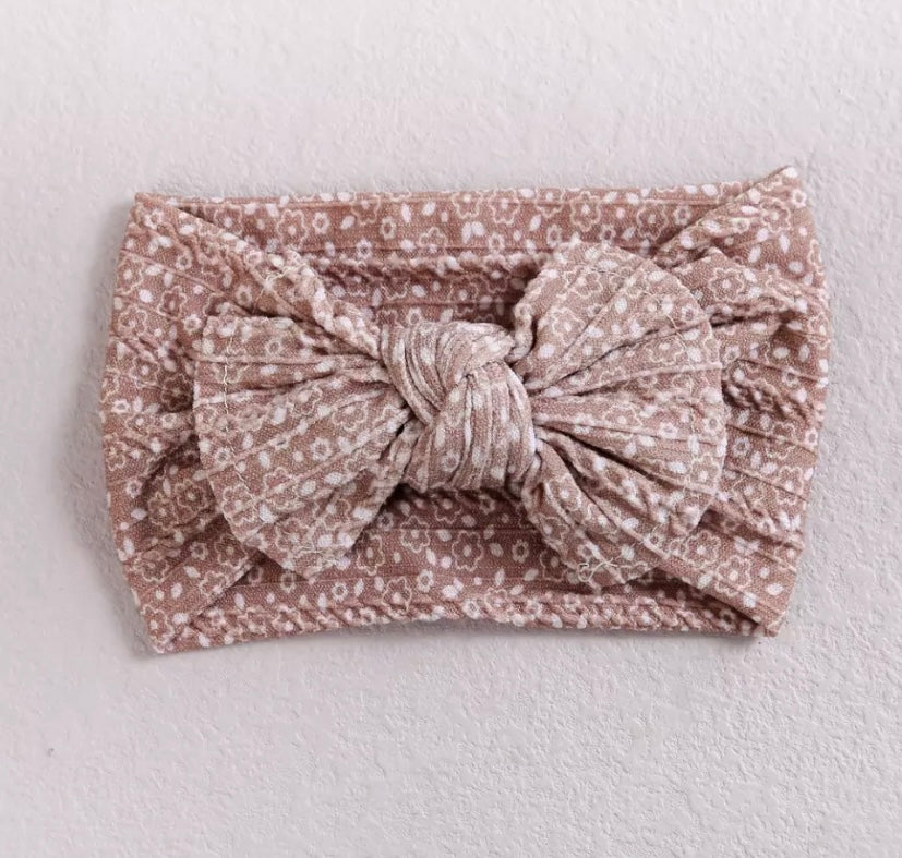 Floral cable knit bow headbands
