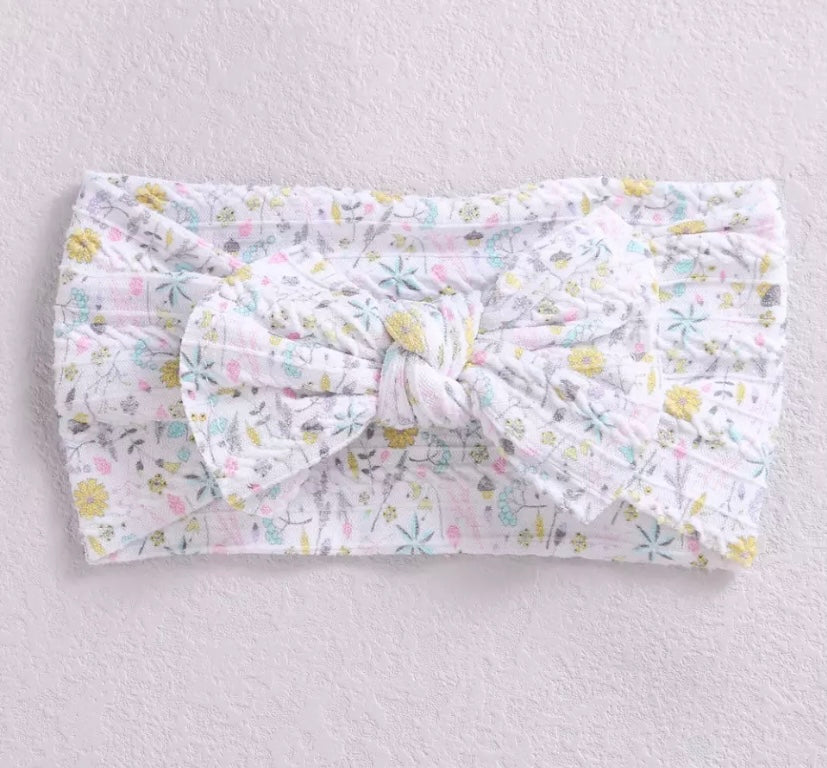 Floral cable knit bow headbands