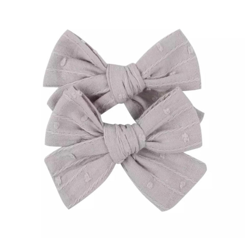 Pig tail clips